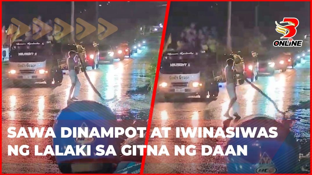 ⁣Sawa dinampot at iwinasiwas ng lalaki sa gitna ng daan